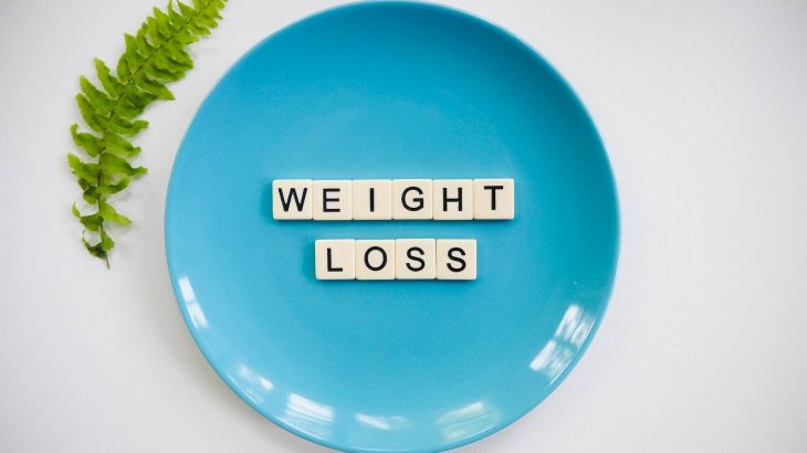 scrabble pieces on a plate